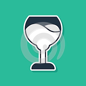 Blue Wine glass icon isolated on green background. Wineglass sign. Vector