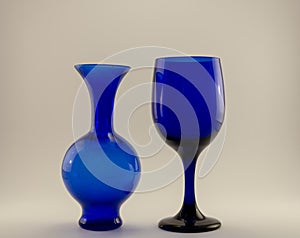 Blue wine glass on blue vase