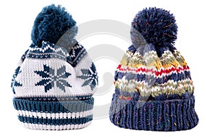 Blue winter bobble ski hat two isolated white