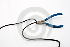 Blue Wire cutter cutting wire