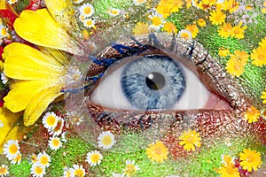 Blue woman eye makeup spring flowers metaphor