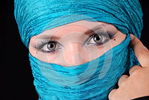 Blue woman's eyes with east make-up