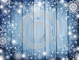 Blue wood background with snow. Frost, snowflakes on the boards. Winter. Christmas. Celebratory background. New Year background.to