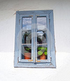 Blue wood window closed