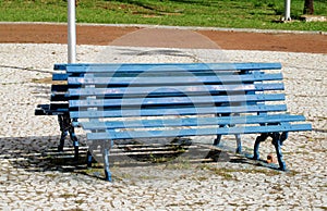 Blue wooden bench in the park