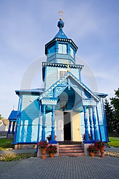 Blue wooden church in Narew, Poland