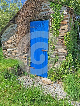 What mysteries lie behind the blue door? photo