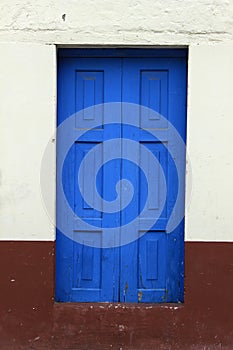 Blue Wooden Door in a Building