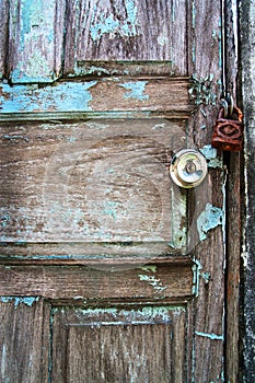 Background closeup of blue and brown color old wooden door, grunge and double lock with old keys, Abstract and backdrop.