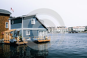 Blue wooden house on the water at Fishermans wharf