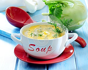 Fresh kohlrabi cream soup with dill photo