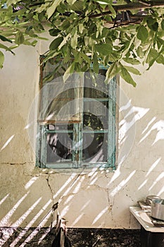 Blue wooden window of an old country house