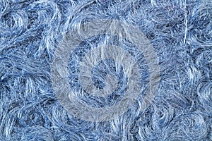 A blue wool cloth texture in a close up view
