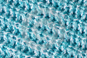 blue woolen material with an interesting pattern