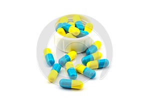 Blue and yellow antibiotic capsule