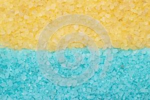 Blue and yellow aromatic bath salt background