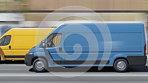 Blue and Yellow Delivery Vans Moving on the Main Street in Broad Daylight