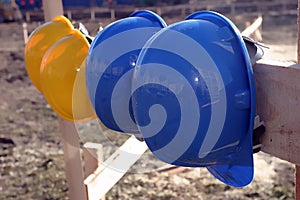 BLUE AND YELLOW HARD HAT