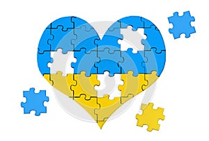 Blue and yellow heart shaped jigsaw puzzle isolated