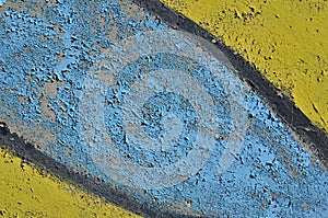 Blue and yellow peeling paint