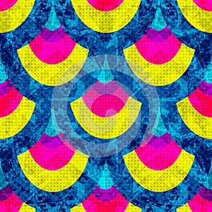 Blue yellow and pink geometric objects on blue background