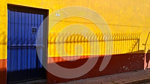 Blue, yellow and red painted wall, Mexico