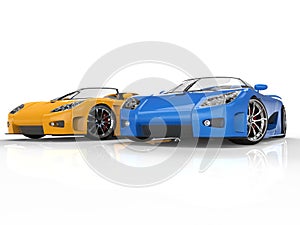 Blue and yellow sportscars on reflective background photo