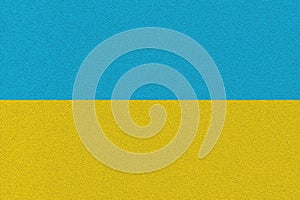 Blue and Yellow Ukrainian national flag as a relief background, art illustration