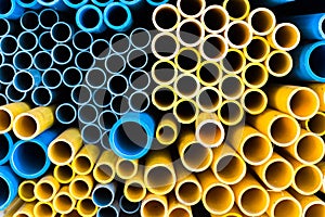 Blue and yellow water pipe isolate on background