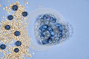 Blueberries and bunting background. snack. muesli. plate heart. with love.