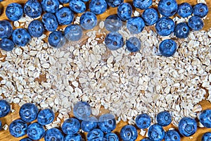 Blueberries and bunting background. snack. muesli. plate heart. with love.