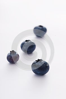 Blueberries closeup on white background