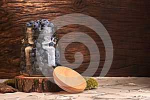 Blueberries fresh front view close up arrangement in glass jar on old white rustic wooden table
