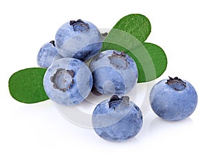 Blueberries with leaves close-up isolated on a white.