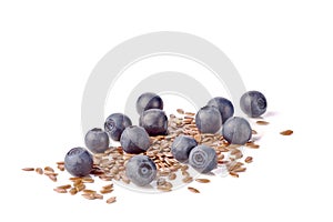 Blueberries and linen seeds on white background