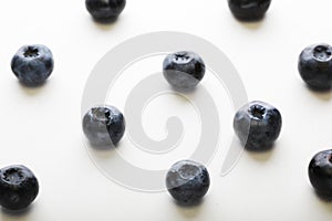 Blueberries patern over white background. Close up.