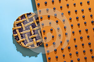 Blueberries pattern and blueberry pie with a lattice crust