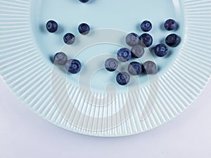 Blueberries on plate, fruits for healthy life