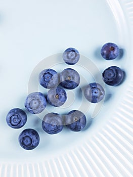 Blueberries on plate, fruits for healthy life