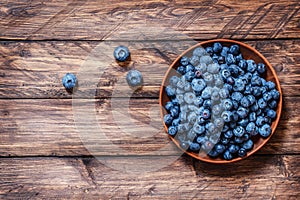 Blueberries on a wooden background