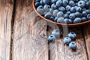 Blueberries on a wooden background