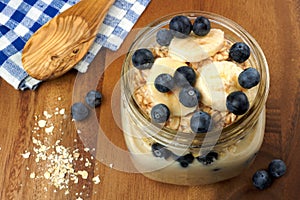 Blueberry and banana breakfast overnight oatmeal in mason jar