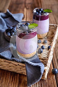 Blueberry cheesecake in a glass jar