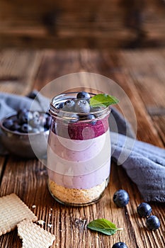 Blueberry cheesecake in a glass jar