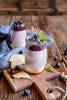Blueberry cheesecake in a glass jar