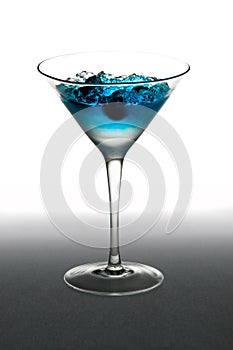 Blueberry cocktail in a martini glass