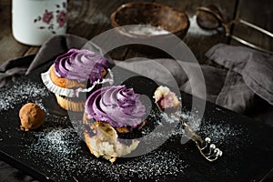 Blueberry cupcakes, chocolate truffle and coffee