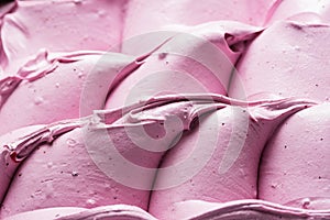 Blueberry flavour gelato - full frame detail. Close up of a pink surface texture of Blueberry Ice cream