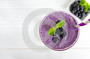 Blueberry Juice smoothies drink in a glass drink purple colorful fruit juice milkshake .