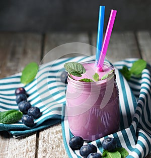 Blueberry Milkshake Smoothie On Wooden Rustic Table